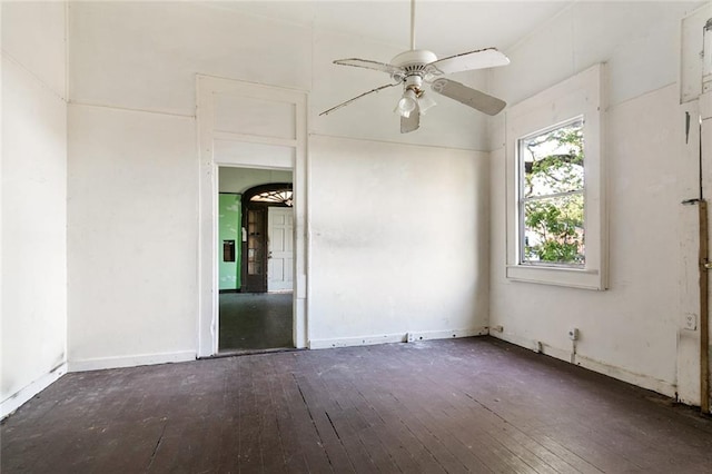 empty room with wood-type flooring and ceiling fan