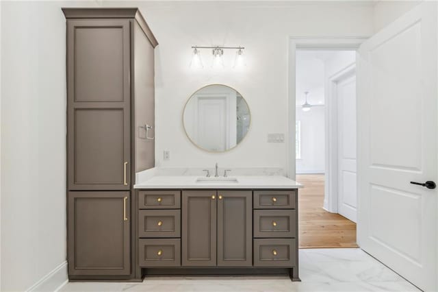 bathroom with vanity and hardwood / wood-style floors