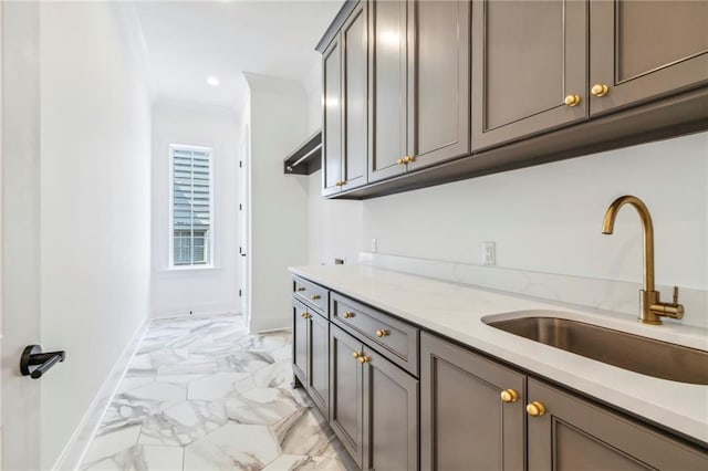 interior space featuring sink and light tile patterned floors