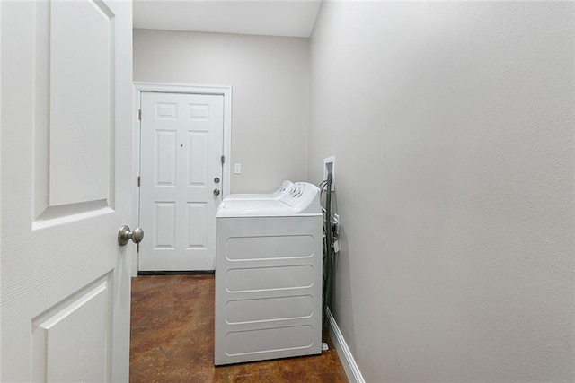 washroom with separate washer and dryer