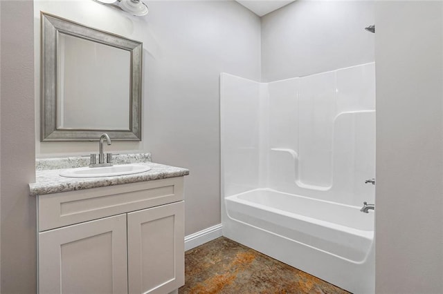 bathroom featuring shower / washtub combination and vanity