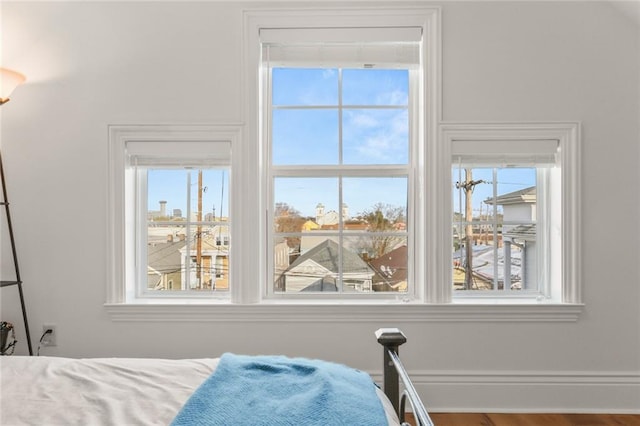 bedroom with hardwood / wood-style flooring