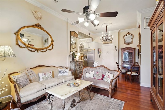 living room with ceiling fan with notable chandelier, crown molding, and dark wood-type flooring