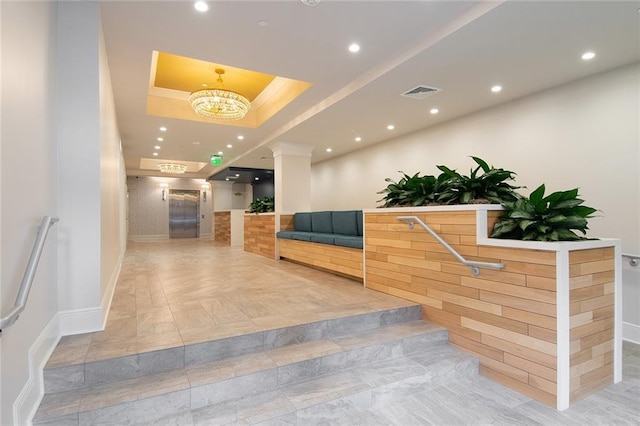 reception area with a chandelier