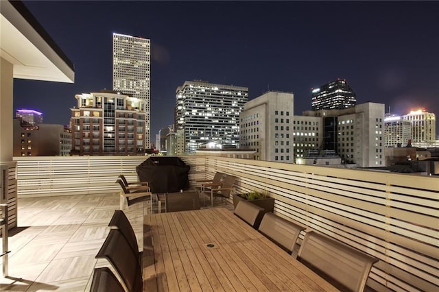 view of balcony at twilight