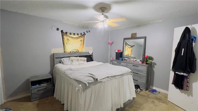 bedroom featuring carpet and ceiling fan