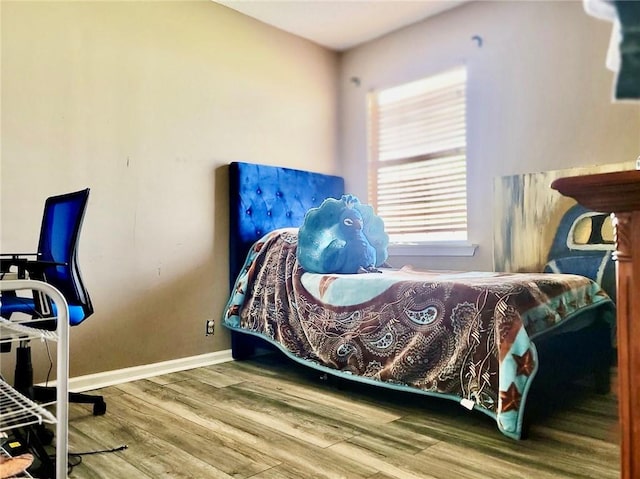 bedroom featuring hardwood / wood-style floors