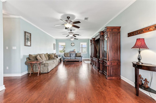 living room with crown molding, dark hardwood / wood-style flooring, and ceiling fan