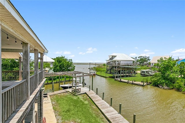 dock area with a water view