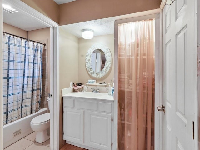 full bathroom with tile patterned flooring, vanity, toilet, and shower / tub combo