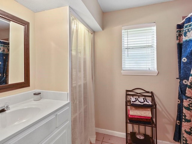 bathroom featuring vanity and tile patterned floors