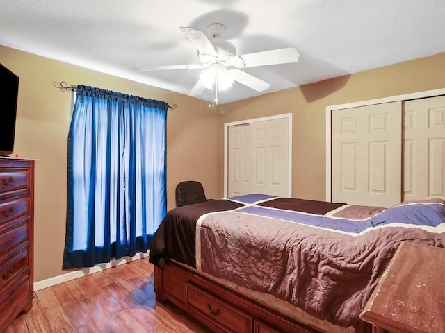 bedroom featuring ceiling fan and light hardwood / wood-style flooring