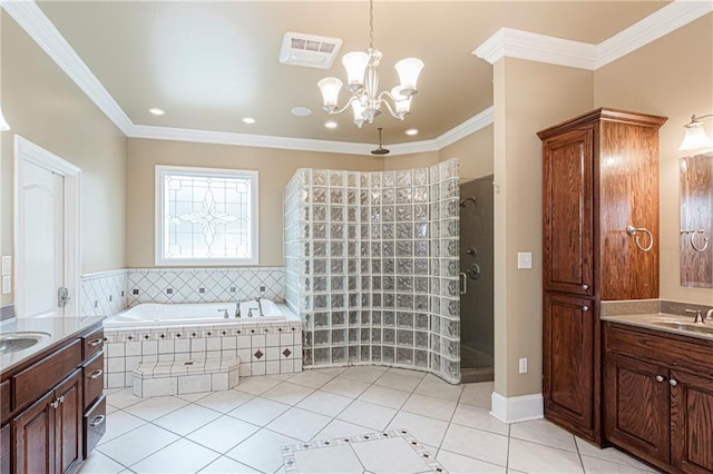 bathroom featuring tile patterned flooring, independent shower and bath, a notable chandelier, and ornamental molding