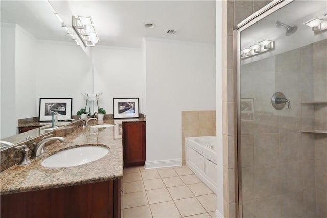 bathroom featuring tile patterned floors, vanity, ornamental molding, and shower with separate bathtub