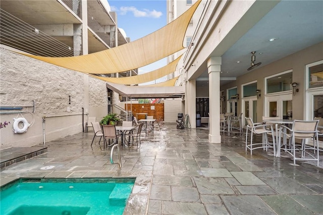 view of swimming pool featuring a patio