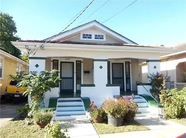 bungalow featuring a porch