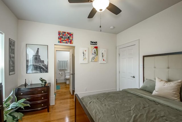 bedroom featuring light wood-style floors and a ceiling fan