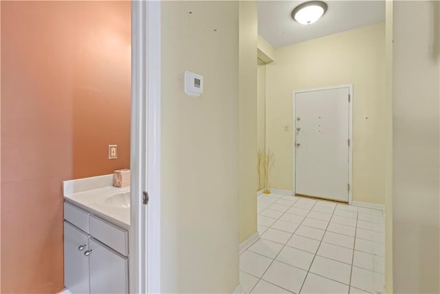 hallway featuring light tile patterned flooring