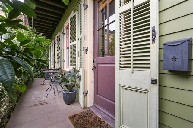 entrance to property with covered porch