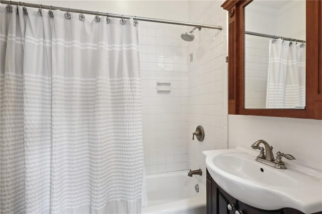 bathroom with vanity and shower / bath combination with curtain