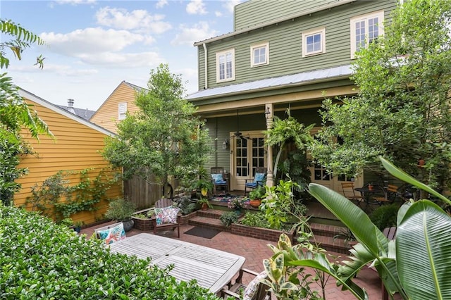 back of house featuring french doors and a patio area