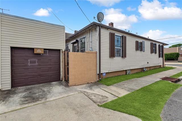 view of property exterior featuring a garage