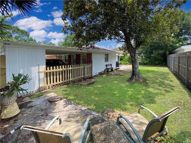 view of yard with fence