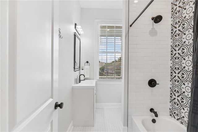 full bathroom featuring shower / bath combination, baseboards, vanity, and tile patterned flooring