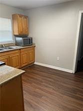 kitchen featuring dark hardwood / wood-style floors