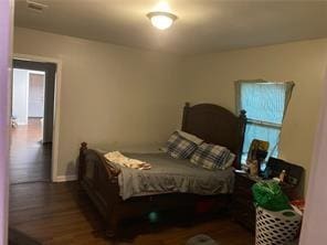 bedroom featuring hardwood / wood-style flooring