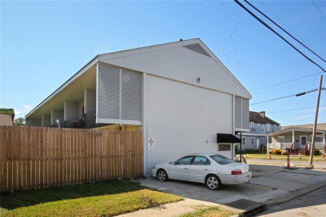 3300 Baronne St, New Orleans, LA 70115 - view of side of home featuring fence