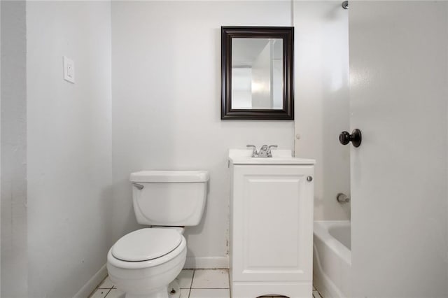 3300 Baronne St, New Orleans, LA 70115 - bathroom featuring a bathing tub, toilet, vanity, tile patterned flooring, and baseboards