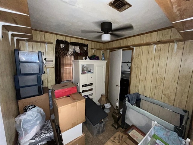 storage area with ceiling fan