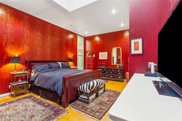 bedroom featuring hardwood / wood-style flooring