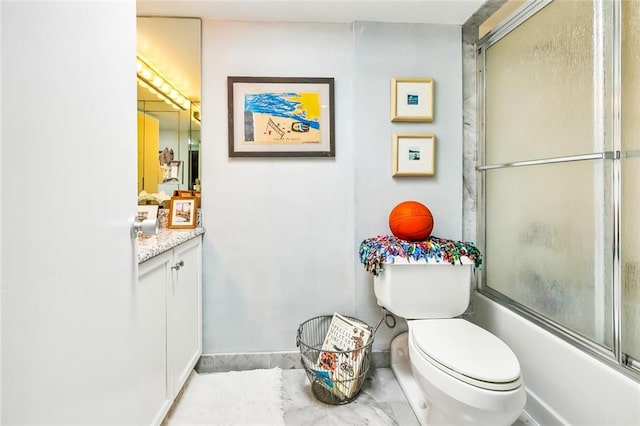 full bathroom featuring tile flooring, combined bath / shower with glass door, toilet, and vanity