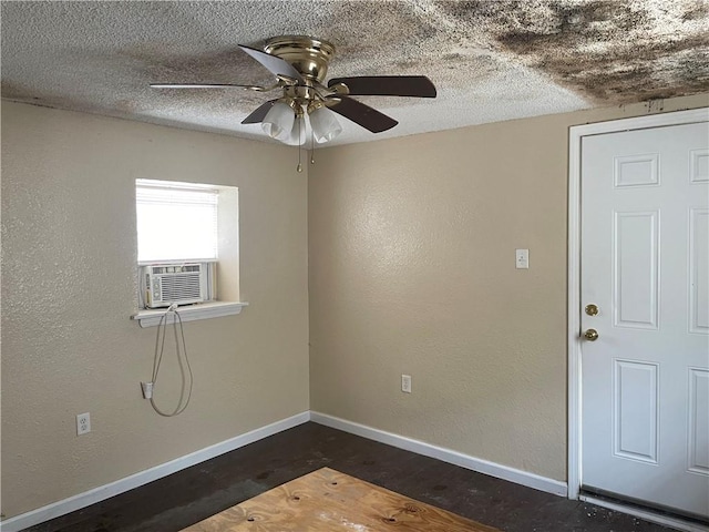 spare room featuring a textured ceiling, ceiling fan, and hardwood / wood-style floors