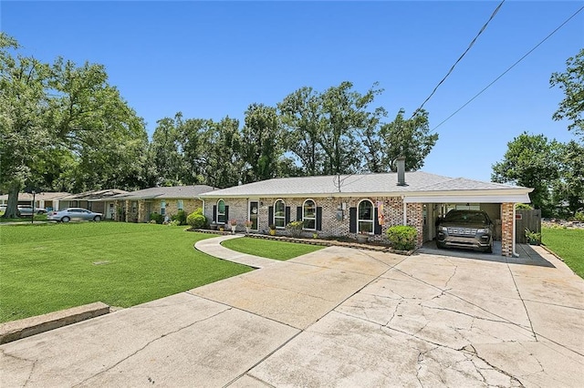 ranch-style home with a carport, driveway, brick siding, and a front yard