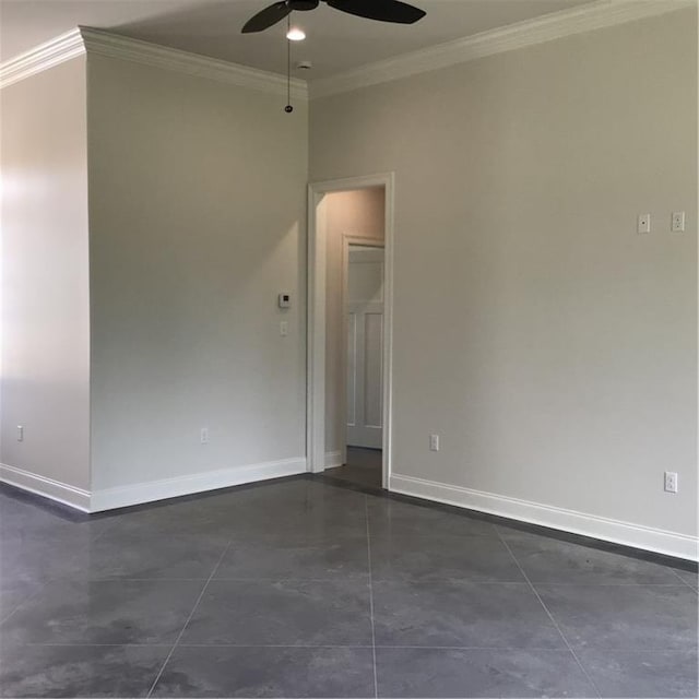 tiled spare room with ceiling fan and ornamental molding