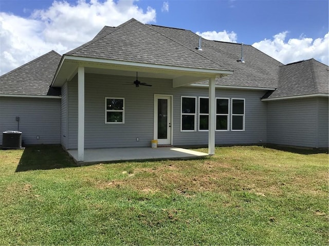 back of house featuring ceiling fan, central air condition unit, a patio, and a lawn