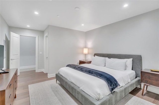 bedroom featuring light hardwood / wood-style floors