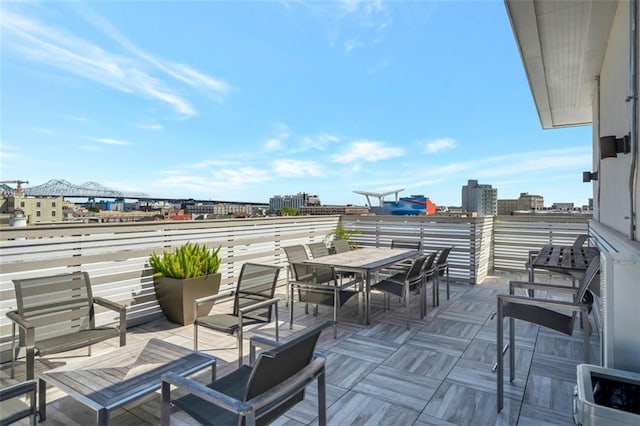 view of patio featuring a balcony