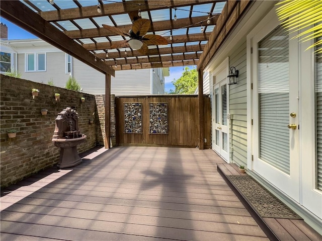 wooden terrace featuring french doors, a pergola, and ceiling fan