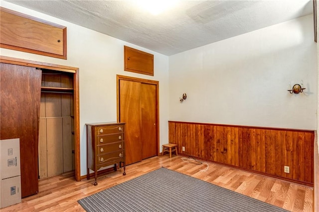 4102 Dauphine St, New Orleans, LA 70117 - unfurnished bedroom with wood finished floors and a closet