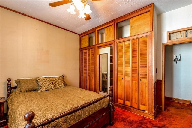 4102 Dauphine St, New Orleans, LA 70117 - bedroom featuring dark colored carpet, crown molding, and ceiling fan