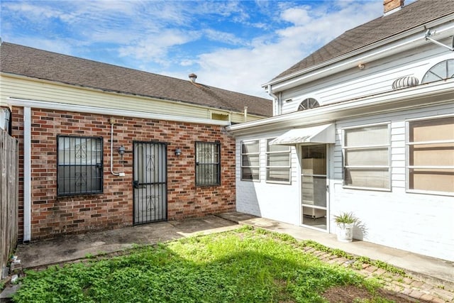 4102 Dauphine St, New Orleans, LA 70117 - view of exterior entry with brick siding