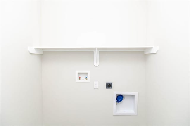 laundry room with hookup for an electric dryer and hookup for a washing machine