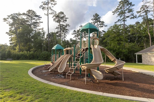 view of jungle gym featuring a lawn