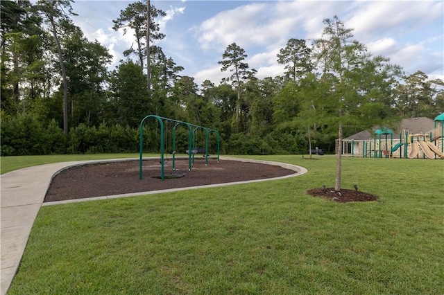 view of playground featuring a lawn