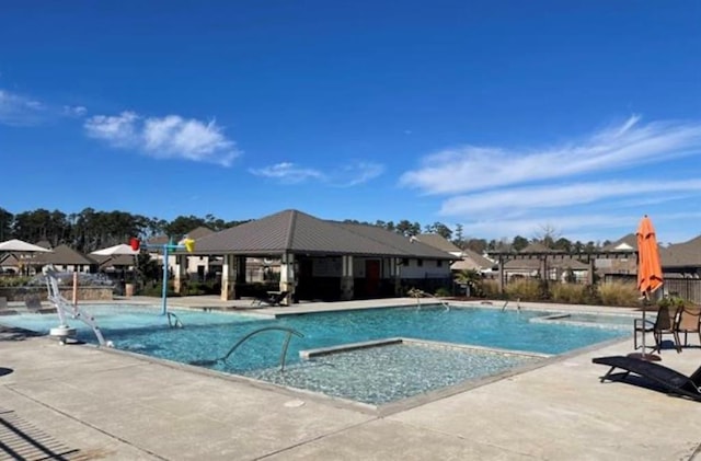 view of pool with a patio area