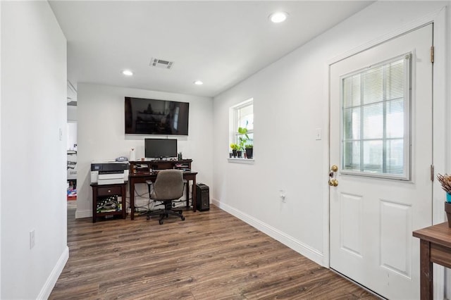 office space with dark hardwood / wood-style floors